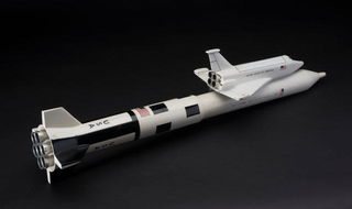 A model of a concept by North American Rockwell for a shuttle with an expendable booster (National Air and Space Museum)